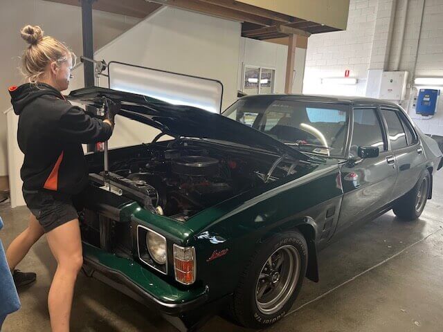 alex workin on car